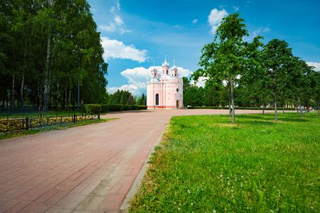 Old beautiful church in Saint Petersburg with blue cloudy sky in backgroundの写真素材