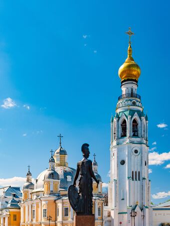 Old Vologda Kremlin and church in northern Russia, Europe. Ancient fortress with while walls, towers and blue cloudy sky in backgroundの写真素材