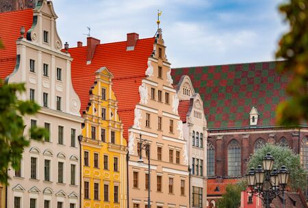 Wroclaw old town houses in Poland, Europe. Blue cloudy sky in backgroundの写真素材