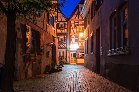 Old town street at night in Wurzburg, Bavaria, Germany. Empty alley with lanterns and traditional Europe architecture.の写真素材