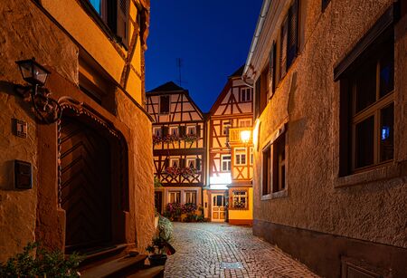 Old town street at night in Wurzburg, Bavaria, Germany. Empty alley with lanterns and traditional Europe architecture.の写真素材