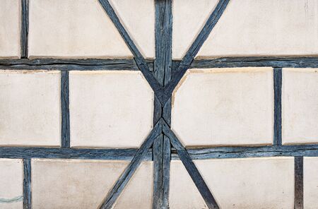 Fachwerk or timbered building wall. Traditional germany architecture in Rothenburg Ob Der Tauber city in Bavaria, Europeの写真素材