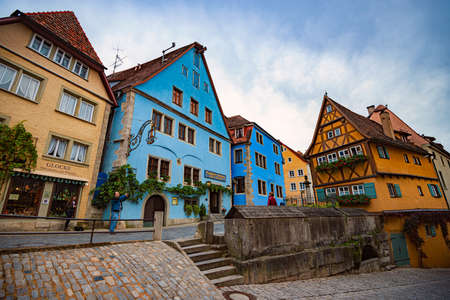 Rothenburg Ob Der Tauber, Germany - SEPTEMBER 24, 2014: View on old city street with traditional architecture of Rothenburg Ob Der Tauber, Bavaria, Germany, Europeのeditorial素材