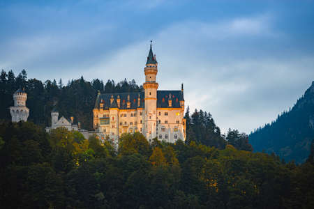 Mountains and lake in Bavaria, Germany, Europe. Sunrise scene with meadow in foreground and cloudy sky in backgroundのeditorial素材