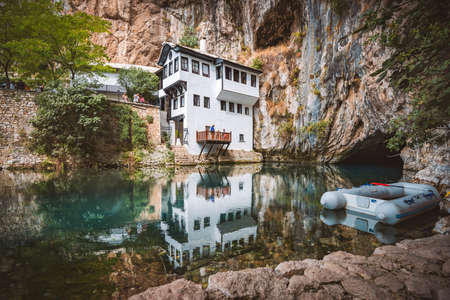 BLAGAJ, BOSNIA AND HERZEGOVINA - SEPTEMBER 10, 2015: Blagaj Tekija was built around 1520, with elements of Ottoman architecture and Mediterranean style and is considered a national monument. Blagaj Tekke is a monastery built for the Dervish.のeditorial素材