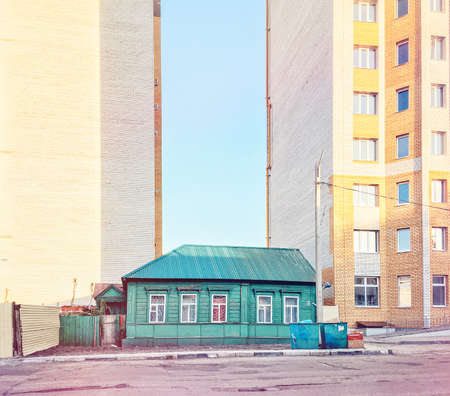 Contrast between old and new house, Russiaの写真素材