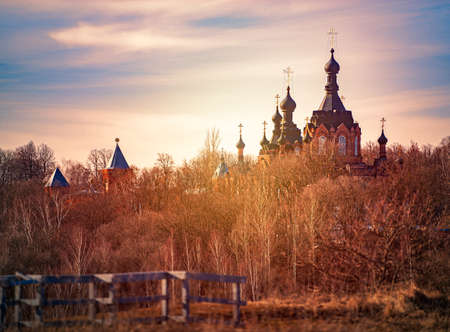 Old russian monastery with blue cloudy sky in backgroundの写真素材