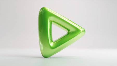 This image features a vibrant green triangular shape with a glossy finish, set against a clean white background, perfect for illustrating modern design concepts.の素材