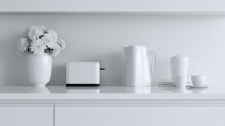 A stylish kitchen countertop featuring white appliances, a floral arrangement, and elegant dishware, perfect for modern home decor inspiration.の素材