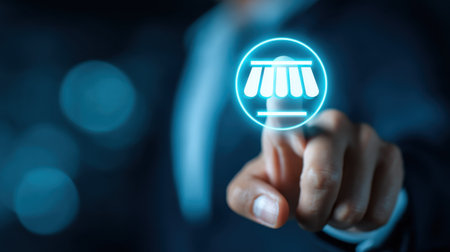 A businessman interacts with a digital interface that showcases a virtual marketplace icon, representing modern technology and online services in a professional environment.の素材