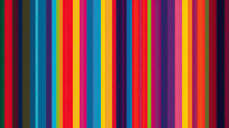 A background with bold, colorful stripes in various shades.の素材