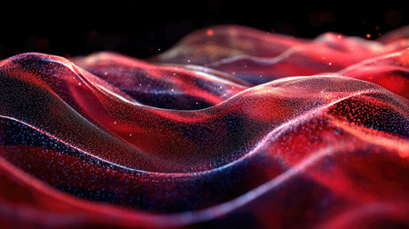 A digital American flag composed of dynamic light particles, flowing and shimmering in a patriotic displayの素材