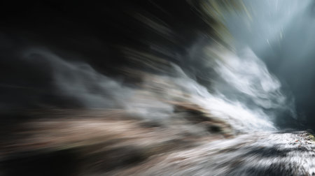 This image captures a mystical forest scene where ethereal mist envelops a dark path, with light rays breaking through the canopy, evoking tranquility and beauty.の素材