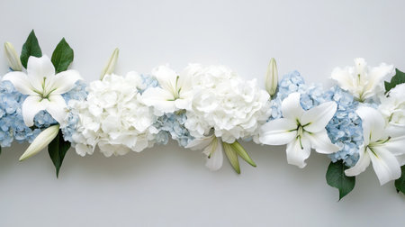 Overhead perspective of a white and pale blue hydrangea garland with lilies, exuding quiet eleganceの素材
