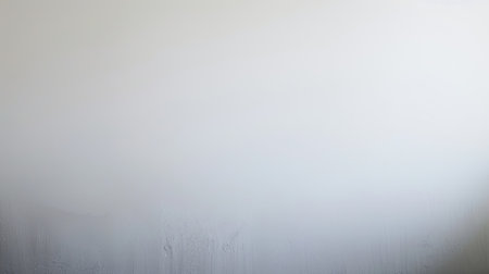 A clean white background with a subtle gradient blending vertically from top to bottom, creating an uncluttered and calm look.の素材