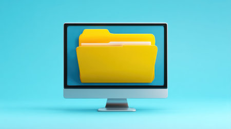 A vibrant computer monitor showcases a yellow folder against a serene blue background, symbolizing digital organization and file management.の素材