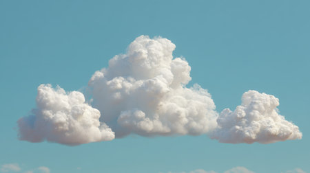 A collection of soft white clouds floats gently across a bright blue sky, creating a serene atmosphere perfect for relaxation and inspiration.の素材