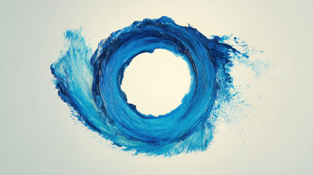 This artistic image captures a vibrant splash of blue water forming a circular shape, embodying energy and beauty within a minimalist design.の素材