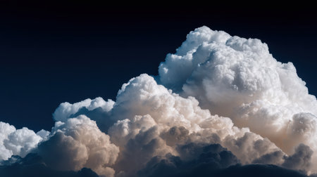 Experience the beauty of nature with this stunning image of soft, fluffy clouds against a deep blue sky, revealing a peaceful atmosphere.の素材