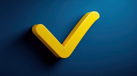 A vibrant yellow checkmark symbol on a deep blue background, conveying a sense of approval, positivity, and successful completion in various fields.の素材