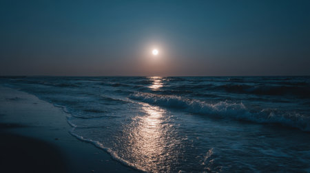 This stunning image captures a serene ocean sunset with gentle waves lapping at the shore, creating a calm and peaceful atmosphere.の素材