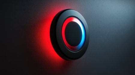 A sleek round control panel featuring vibrant red and blue LED lights on a textured dark wall, representing modern technology aesthetics.の素材