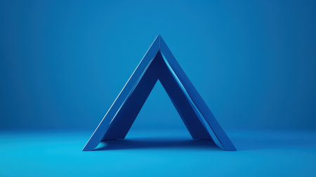 A striking geometric shape presented in vibrant blue against a smooth backdrop, suitable for artistic projects, advertisements, or creative presentations.の素材