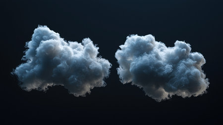 A pair of soft and fluffy dark clouds create an intriguing atmospheric scene, showcasing their unique texture against a mysterious backdrop.の素材