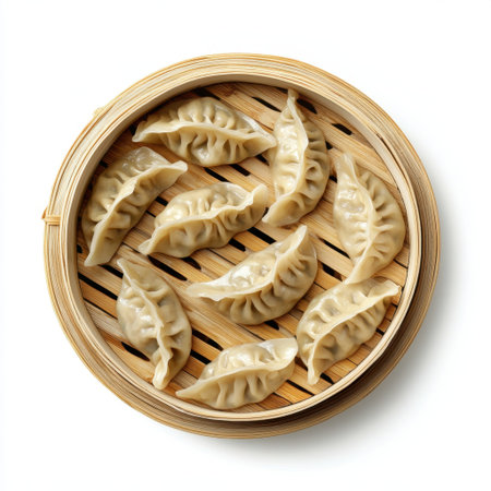 A collection of freshly steamed dumplings arranged in a bamboo steamer, showcasing the delicate craftsmanship and inviting presentation of traditional Asian cuisine.の素材