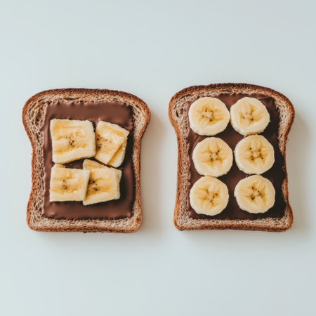 This image features slices of bread spread with chocolate and topped with fresh banana, ideal for a delicious breakfast or snack. Enjoy a simple yet satisfying treat.の素材