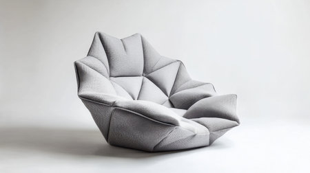 This stunning sculptural gray chair features a unique geometric design, perfect for enhancing modern interiors and adding a touch of elegance.の素材