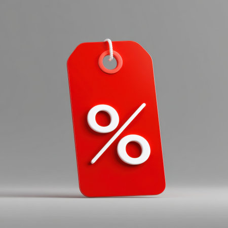 A bright red price tag featuring a prominent percent sign, set against a grey background, ideal for representing discounts and promotions.の素材