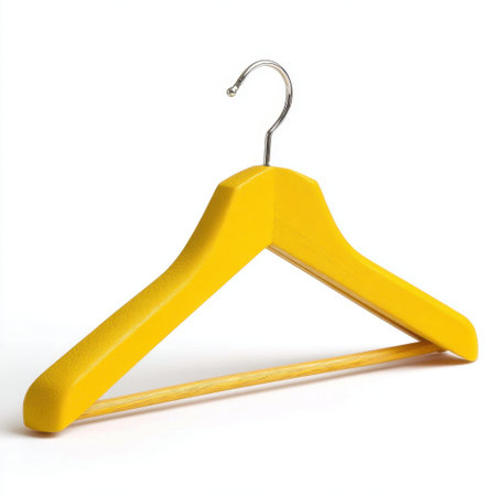 A bright yellow wooden hanger ideal for displaying clothes in a stylish and organized manner. Perfect for modern minimalistic spaces and retail displays.の素材