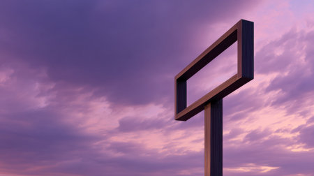 An empty billboard frame stands alone against a stunning sunset sky, featuring vibrant clouds in shades of purple and orange, presenting an opportunity for creativity.の素材