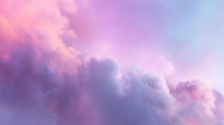 This mesmerizing image showcases soft and fluffy clouds in beautiful pastel pink and purple tones, creating a serene and dreamy atmosphere.の素材