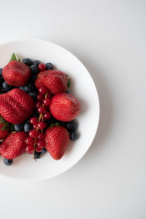 fresh plate of berries for breakfastの写真素材