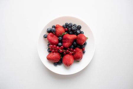 fresh plate of berries for breakfastの写真素材