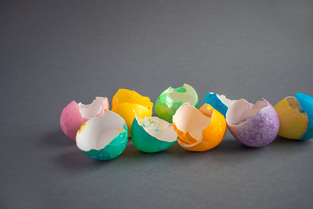 Colored eggshells on a dark backgroundの写真素材