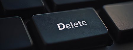 A close-up of the computer's Delete key.の素材