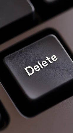 A close-up of the computer's Delete key.の素材