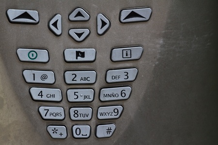 A spanish number pad of a public telephoneの写真素材