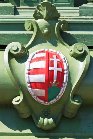 Cast Iron hungarian symbol on a bridge in Budapestの写真素材