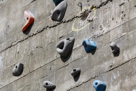 A segment of a climbing wall with a difficult patternの写真素材