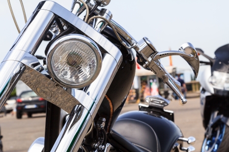 Headlamp of a chopper in front of chrome elementsの写真素材