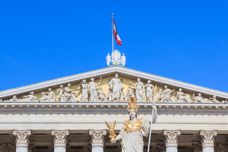 Facade of the Austrian Parliament with a statue of  Pallas Athene in Viennaの写真素材