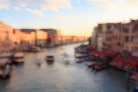 Blurred view on canal grande vom Rialto bridge at sunset in Venice, Italyの写真素材