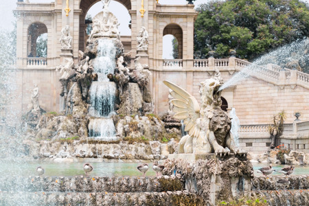 Water spouting winged gryphon statue at the fountain in parc de la ciutadella, Barcelona, Spainの写真素材