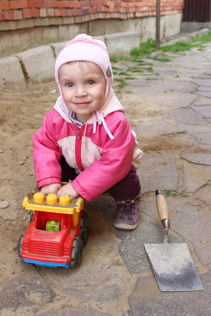 little builder likes to build from sandの写真素材
