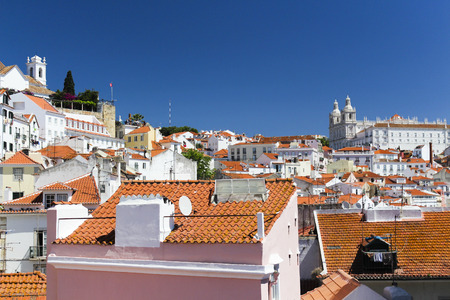 Vibrant rooftops of Alfama district in Lisbon in late springの写真素材