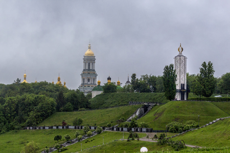 A wiev of Kiev Pechersk Lavra and Henocide Monumentのeditorial素材